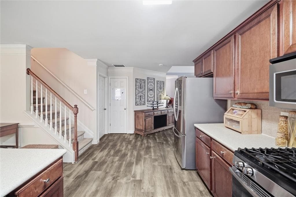 4 bedroom, 3 bathroom, 2,545 sq ft single family residence for sale at 5520 Brighton Rose Lane, Sugar Hill, GA 30518 — photo 7