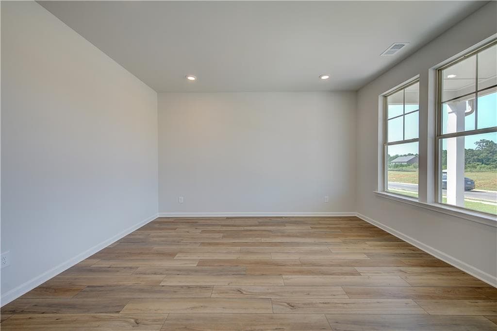 4 bedroom, 3 bathroom, 3,415 sq ft single family residence for sale at 729 Dunlake Way, Locust Grove, GA 30248 — photo 7