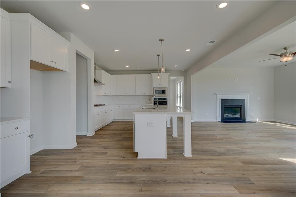 4 bedroom, 3 bathroom, 3,415 sq ft single family residence for sale at 729 Dunlake Way, Locust Grove, GA 30248 — photo 10