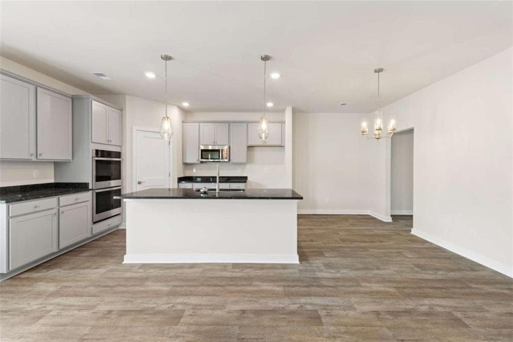 4 bedroom, 3 bathroom, 2,700 sq ft single family residence for sale at 1921 Wheat valley Circle, Conyers, GA 30013 — photo 6