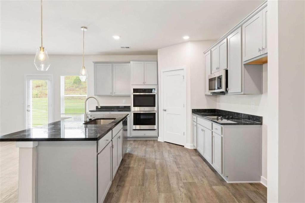 4 bedroom, 3 bathroom, 2,700 sq ft single family residence for sale at 1921 Wheat valley Circle, Conyers, GA 30013 — photo 8