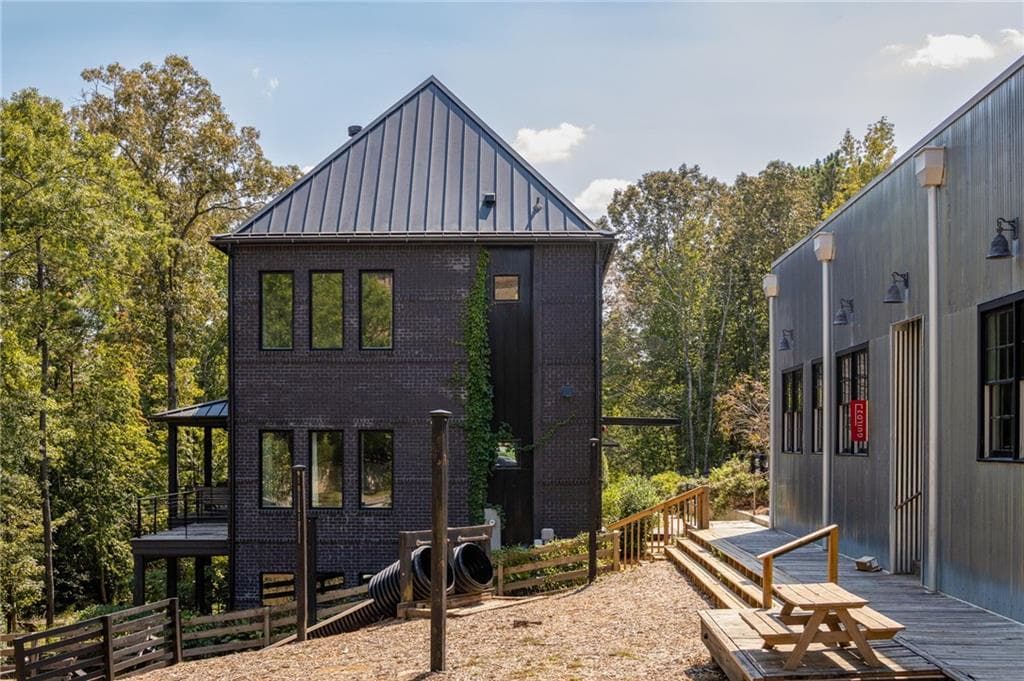 3 bedroom, 4 bathroom, 2,436 sq ft townhouse for sale at 10630 Serenbe Lane, Chattahoochee Hills, GA 30268 — photo 1 of 31