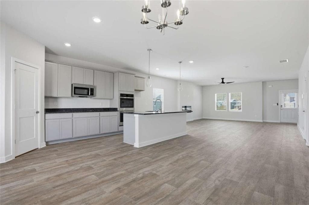 5 bedroom, 4 bathroom, 3,150 sq ft single family residence for sale at 1929 Wheat valley Circle, Conyers, GA 30013 — photo 6