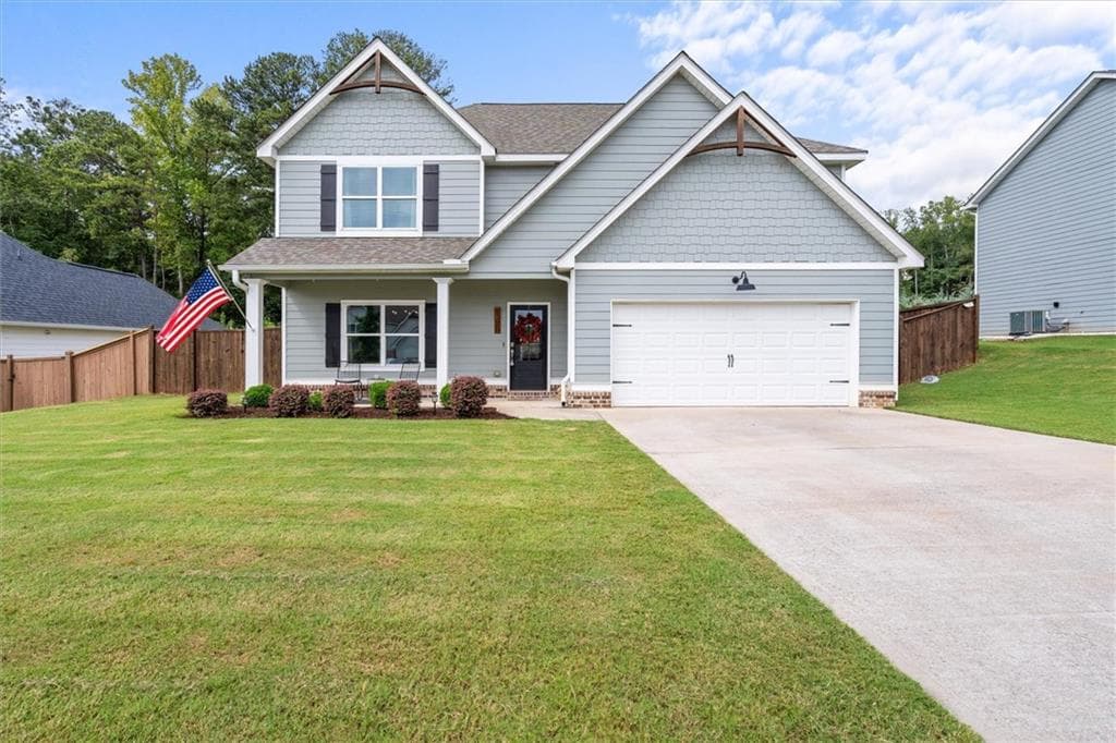 4 bedroom, 3 bathroom, 2,637 sq ft single family residence for sale at 145 Springwood Drive, Carrollton, GA 30117 — photo 1 of 38