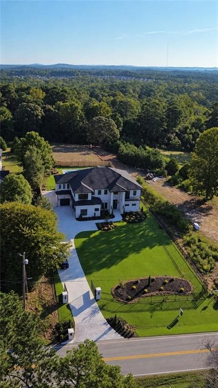 6 bedroom, 7 bathroom, 7,400 sq ft single family residence for sale at 3425 Thompson Mill Road, Buford, GA 30519