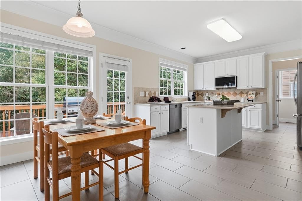 5 bedroom, 4 bathroom, 3,253 sq ft single family residence for sale at 3585 Davyne Bend, Cumming, GA 30040 — photo 7