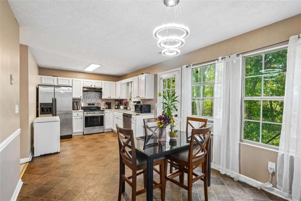4 bedroom, 3 bathroom, 1,500 sq ft single family residence for sale at 541 Melrose Drive, Forest Park, GA 30297 — photo 5