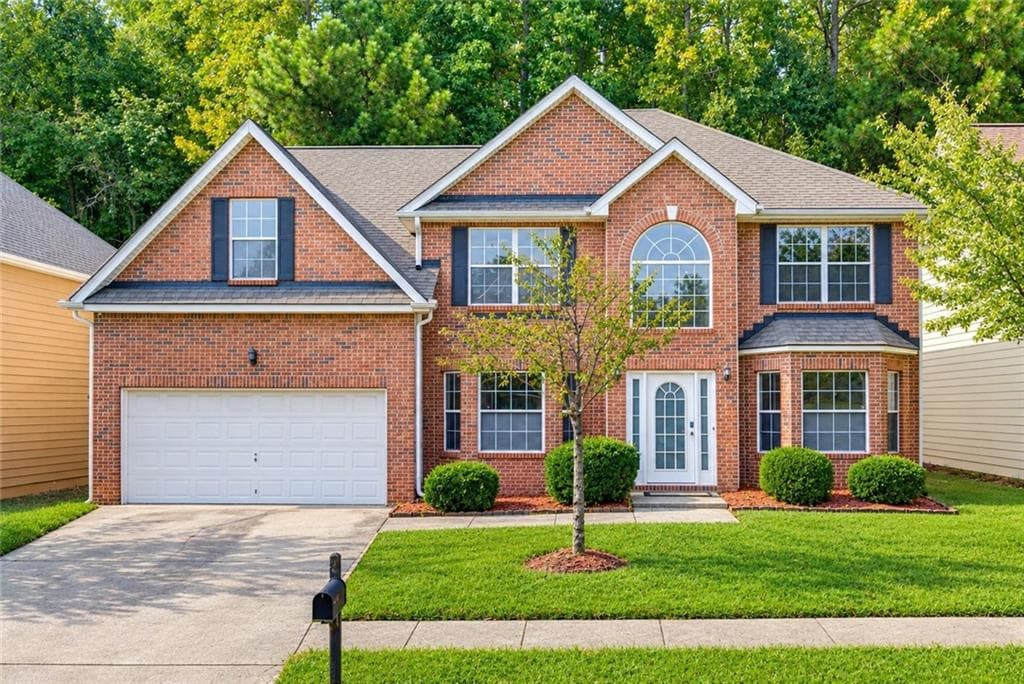 5 bedroom, 3 bathroom, 3,377 sq ft single family residence for sale at 2023 Tulip Petal Road, Auburn, GA 30011