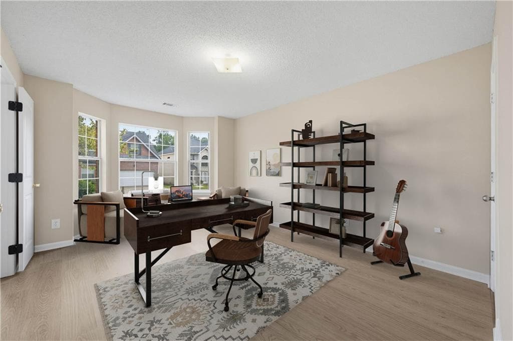 5 bedroom, 3 bathroom, 3,377 sq ft single family residence for sale at 2023 Tulip Petal Road, Auburn, GA 30011 — photo 4