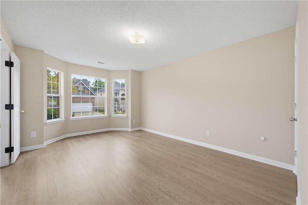 5 bedroom, 3 bathroom, 3,377 sq ft single family residence for sale at 2023 Tulip Petal Road, Auburn, GA 30011 — photo 5