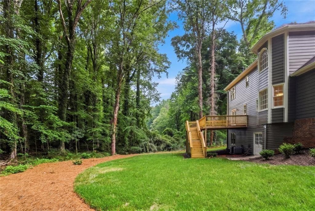 3 bedroom, 3 bathroom, 2,692 sq ft single family residence for sale at 3845 Jettie Court, Lilburn, GA 30047 — photo 2