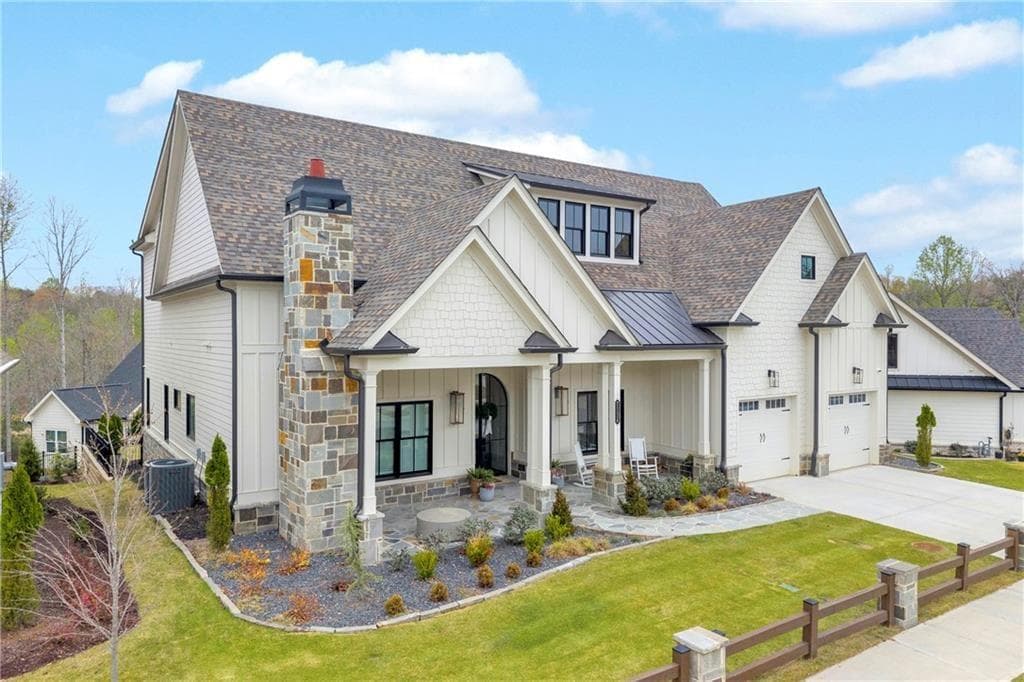 6 bedroom, 5 bathroom, 5,188 sq ft single family residence for sale at 7134 Bluebird Cove, Gainesville, GA 30506 — photo 2