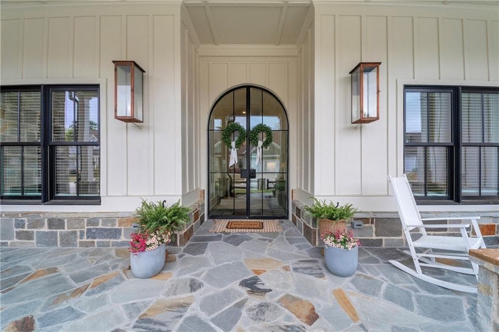 6 bedroom, 5 bathroom, 5,188 sq ft single family residence for sale at 7134 Bluebird Cove, Gainesville, GA 30506 — photo 5