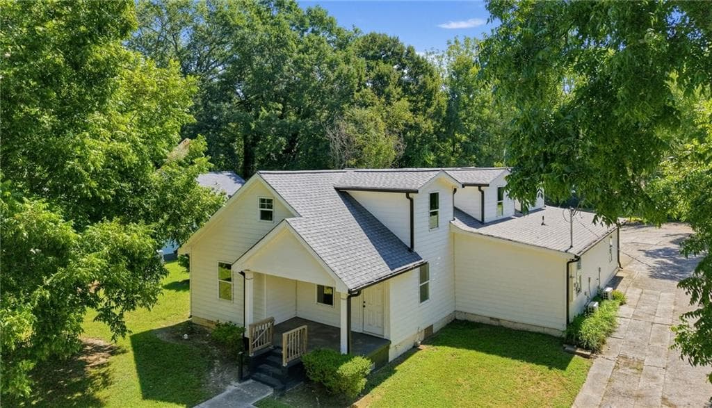 5 bedroom, 4 bathroom, 3,738 sq ft single family residence for sale at 134 E 5th Street, Monroe, GA 30655 — photo 3