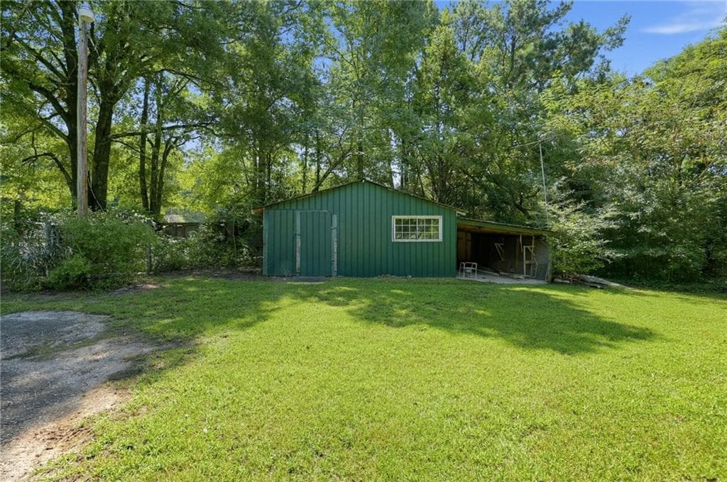 5 bedroom, 4 bathroom, 3,738 sq ft single family residence for sale at 134 E 5th Street, Monroe, GA 30655 — photo 10