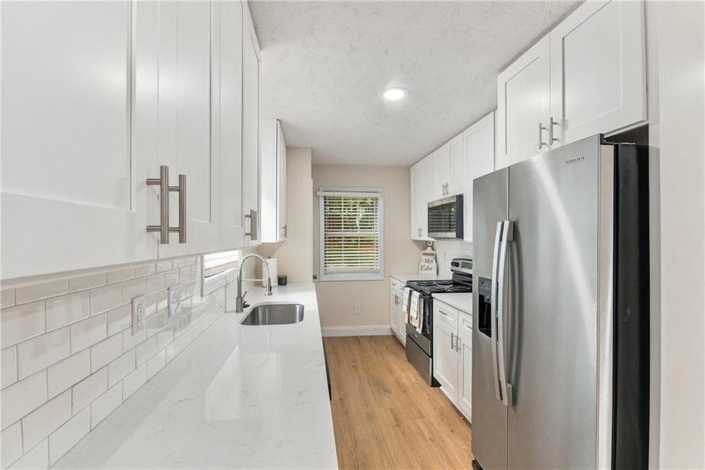 4 bedroom, 3 bathroom, 1,663 sq ft single family residence for sale at 3220 Bethesda Park Court, Lawrenceville, GA 30044 — photo 9