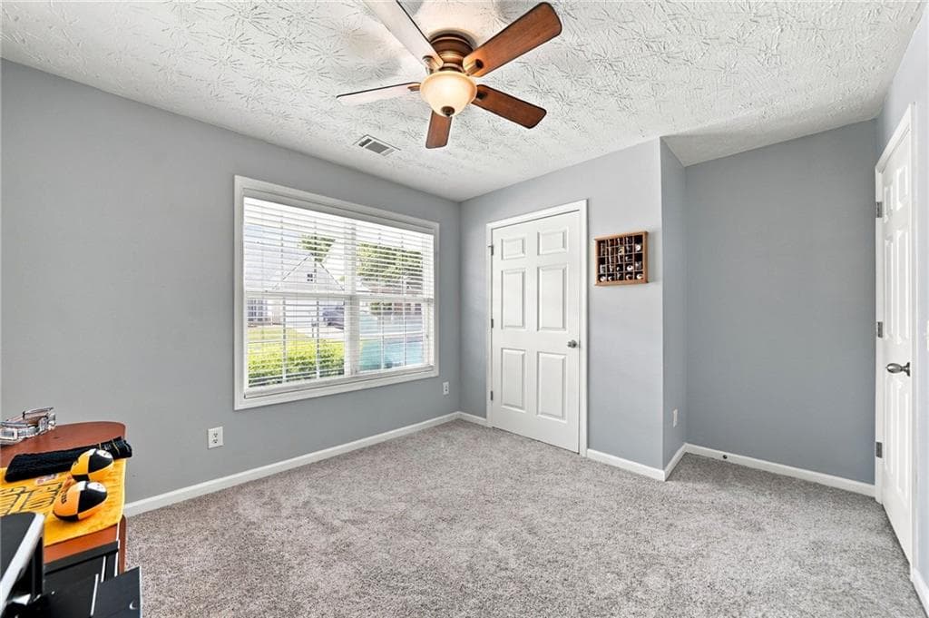 3 bedroom, 2 bathroom, 2,061 sq ft single family residence for sale at 128 Village Drive, Canton, GA 30114 — photo 10