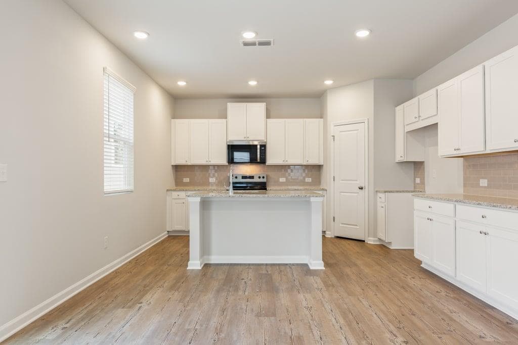 4 bedroom, 4 bathroom, 2,343 sq ft single family residence for sale at 8039 Dickens Drive, Fairburn, GA 30213 — photo 7
