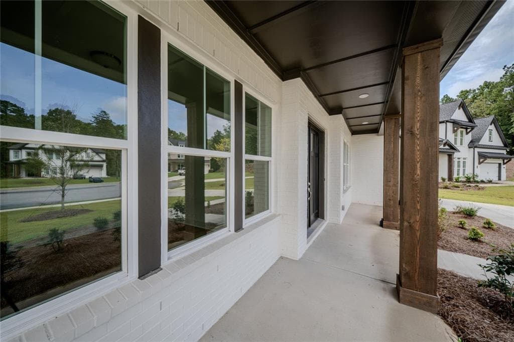 5 bedroom, 6 bathroom, 3,871 sq ft single family residence for sale at 7004 Foundry Drive, Woodstock, GA 30188 — photo 2