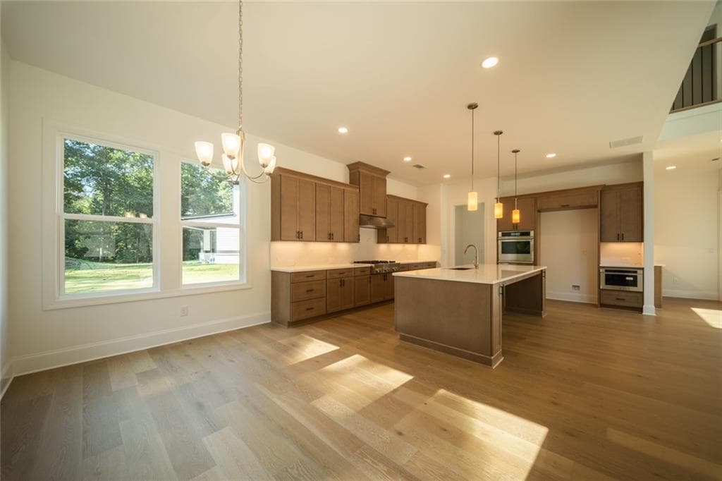 5 bedroom, 6 bathroom, 3,871 sq ft single family residence for sale at 7004 Foundry Drive, Woodstock, GA 30188 — photo 7