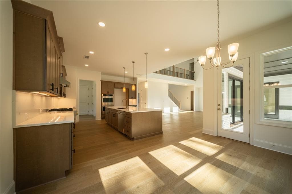 5 bedroom, 6 bathroom, 3,871 sq ft single family residence for sale at 7004 Foundry Drive, Woodstock, GA 30188 — photo 8