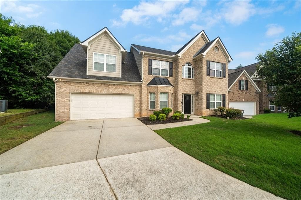 5 bedroom, 3 bathroom, 2,762 sq ft single family residence for sale at 6973 Grand Hickory Drive, Braselton, GA 30517 — photo 2