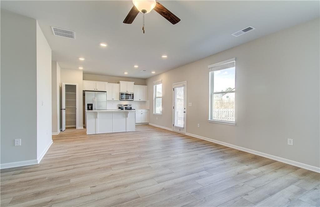 4 bedroom, 3 bathroom, 2,001 sq ft single family residence for sale at 11974 Brightside Parkway, Hampton, GA 30228 — photo 7