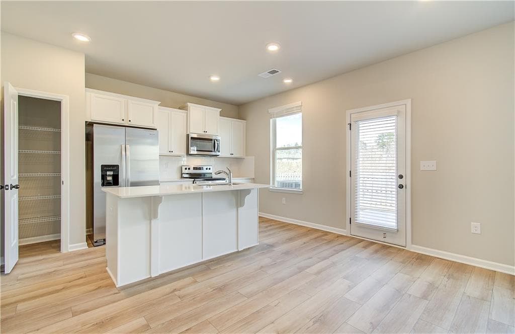 4 bedroom, 3 bathroom, 2,001 sq ft single family residence for sale at 11974 Brightside Parkway, Hampton, GA 30228 — photo 9