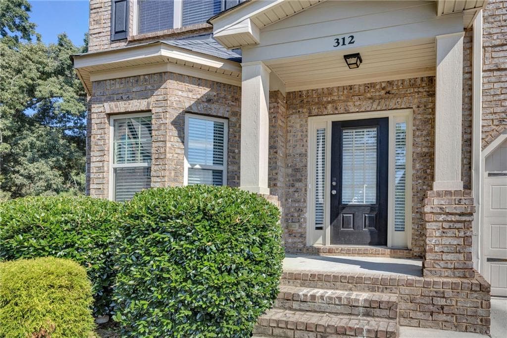 5 bedroom, 4 bathroom, 3,364 sq ft single family residence for sale at 312 Tates Court, Loganville, GA 30052 — photo 3