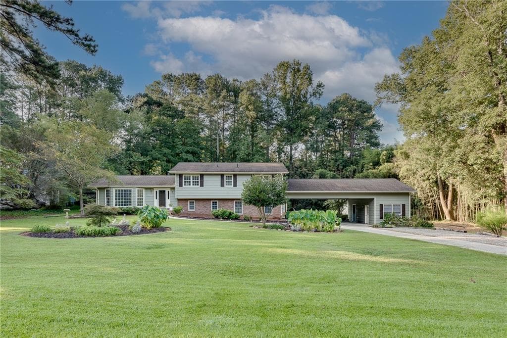 5 bedroom, 3 bathroom, 2,138 sq ft single family residence for sale at 1660 Northwoods Drive, Marietta, GA 30066