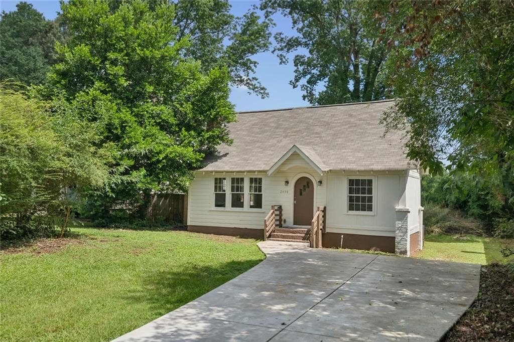 4 bedroom, 2 bathroom, 1,850 sq ft single family residence for sale at 2498 White Oak Drive, Decatur, GA 30032 — photo 2