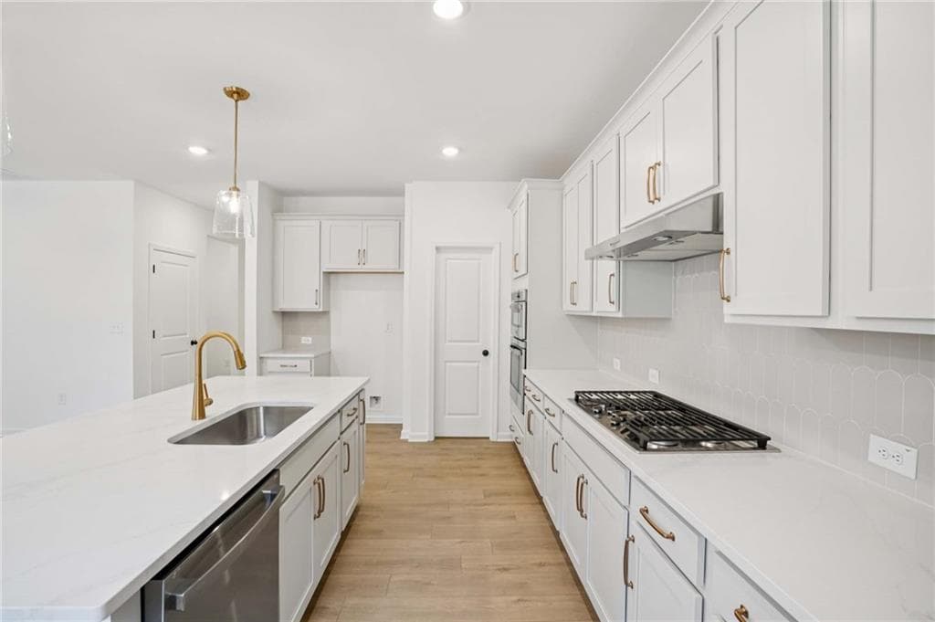 5 bedroom, 4 bathroom, 3,358 sq ft single family residence for sale at 6244 Kismet Road, Buford, GA 30518 — photo 10