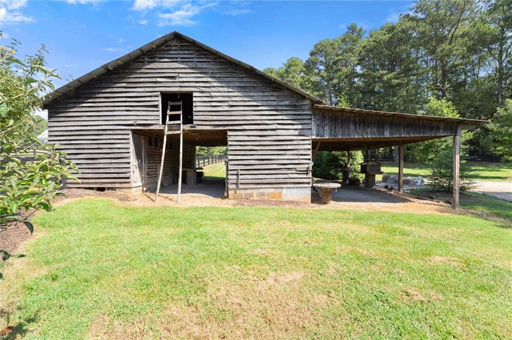 6 bedroom, 8 bathroom, 8,196 sq ft single family residence for sale at 15995 Freemanville Road, Milton, GA 30004 — photo 6