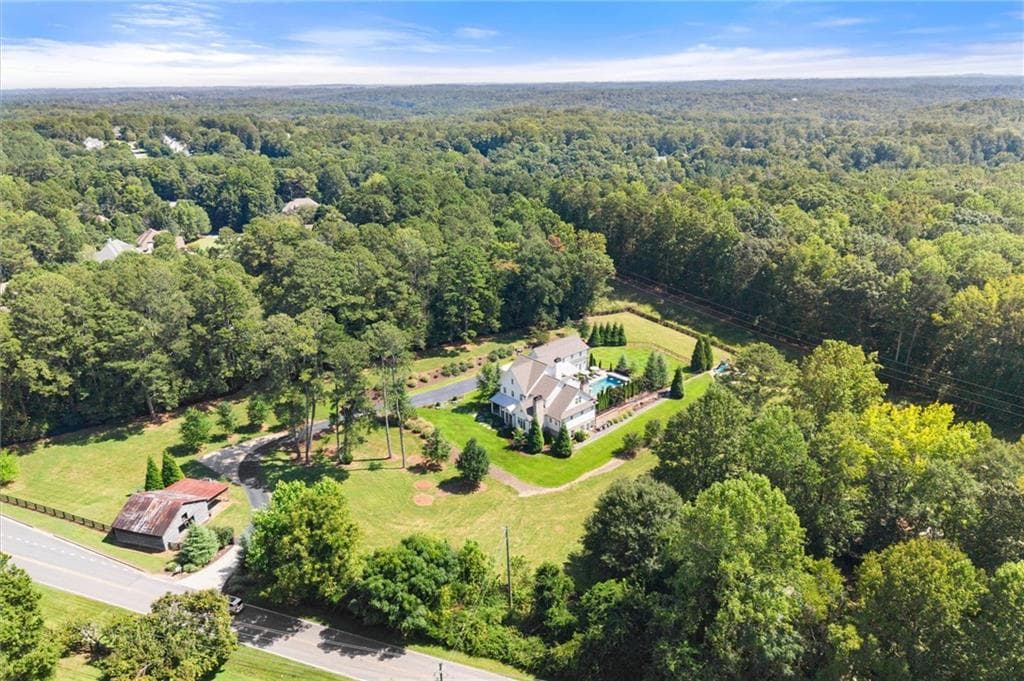 6 bedroom, 8 bathroom, 8,196 sq ft single family residence for sale at 15995 Freemanville Road, Milton, GA 30004 — photo 2