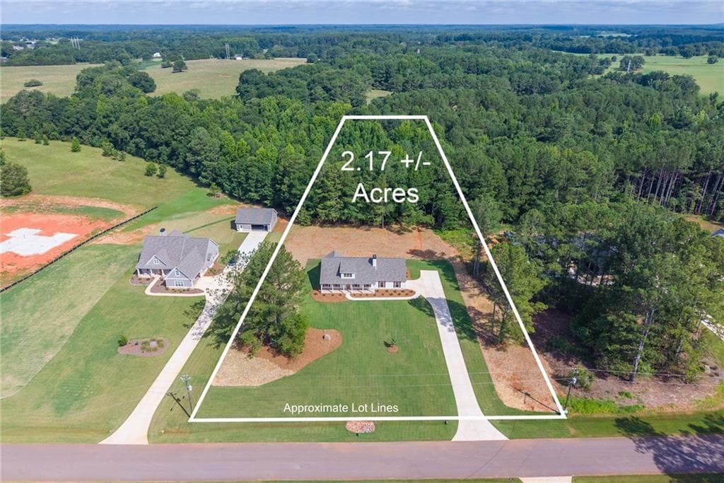 4 bedroom, 3 bathroom, 2,162 sq ft single family residence for sale at 218 Woodfin Way, Social Circle, GA 30025 — photo 2