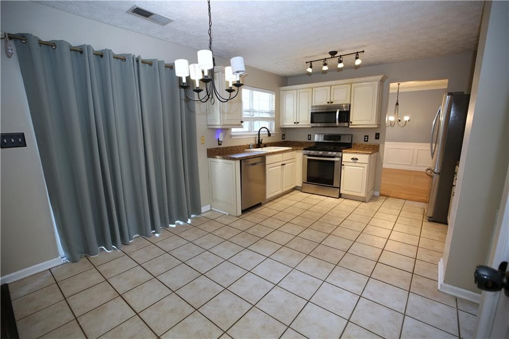 3 bedroom, 3 bathroom, 2,028 sq ft single family residence for sale at 4246 Brighton Way, Kennesaw, GA 30144 — photo 10