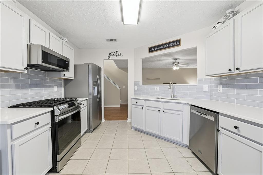 3 bedroom, 3 bathroom, 1,848 sq ft single family residence for sale at 313 Westminster Drive, Canton, GA 30114 — photo 2
