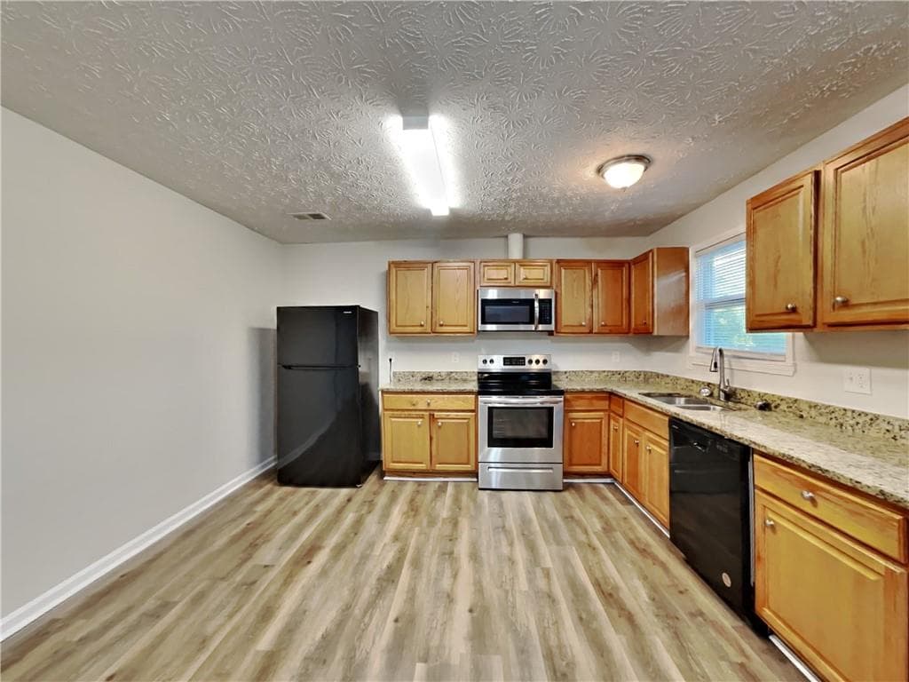 3 bedroom, 2 bathroom, 1,439 sq ft single family residence for rent at 7510 Elliot Way, Jonesboro, GA 30236 for $1,780 a month — photo 2