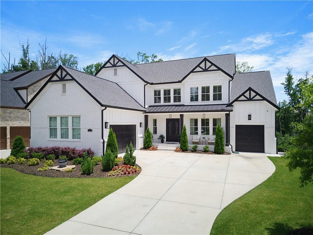 4 bedroom, 5 bathroom, 6,115 sq ft single family residence for sale at 4990 Iris Street, Cumming, GA 30040