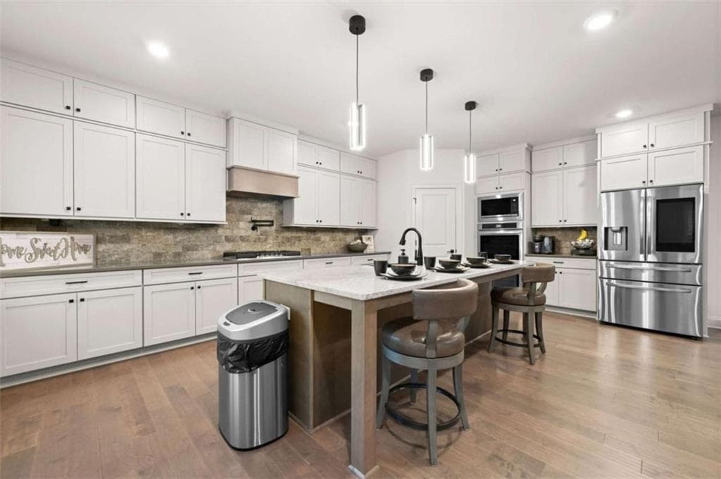 5 bedroom, 4 bathroom, 3,953 sq ft single family residence for sale at 3077 Reserve Court, Conyers, GA 30094 — photo 10