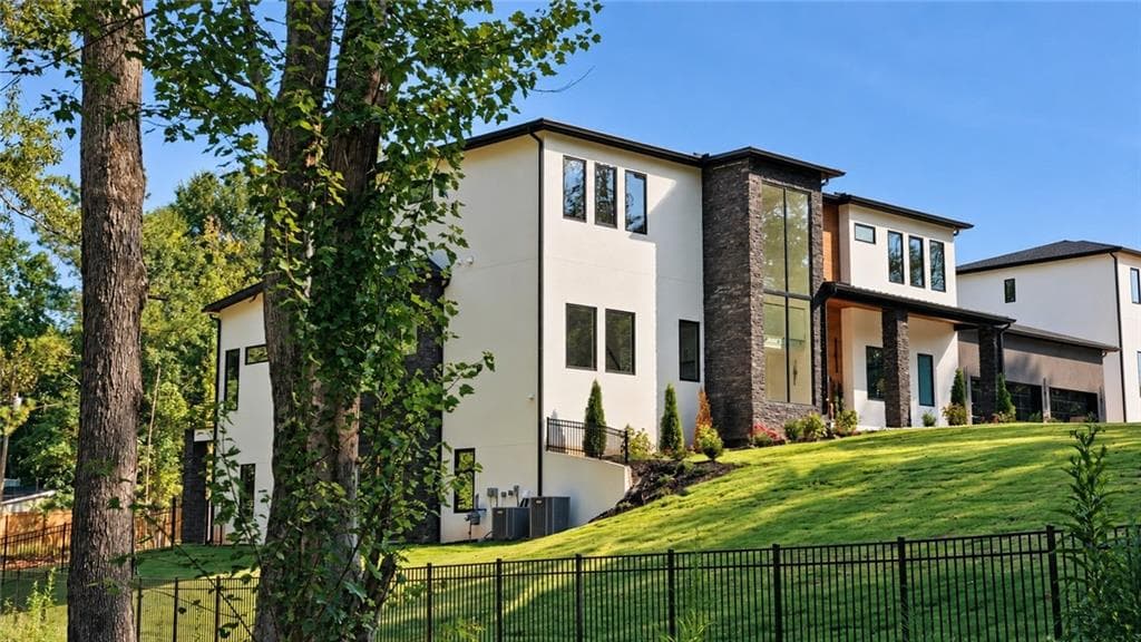 6 bedroom, 8 bathroom, 8,850 sq ft single family residence for sale at 91 Serenity Lane, Auburn, GA 30011