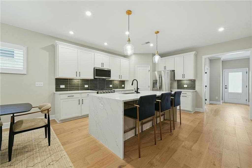 5 bedroom, 3 bathroom, 2,866 sq ft single family residence for sale at 6130 Marigold Way, Atlanta, GA 30349 — photo 7