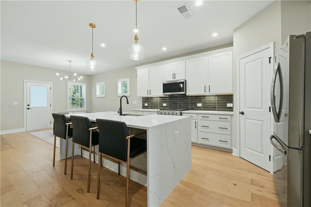 5 bedroom, 3 bathroom, 2,866 sq ft single family residence for sale at 6130 Marigold Way, Atlanta, GA 30349 — photo 8