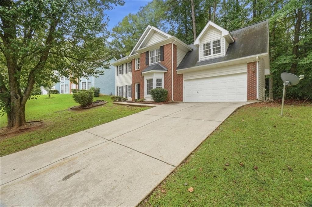 4 bedroom, 3 bathroom, 1,928 sq ft single family residence for sale at 7145 Lone Oak Trace, Lithonia, GA 30058 — photo 2