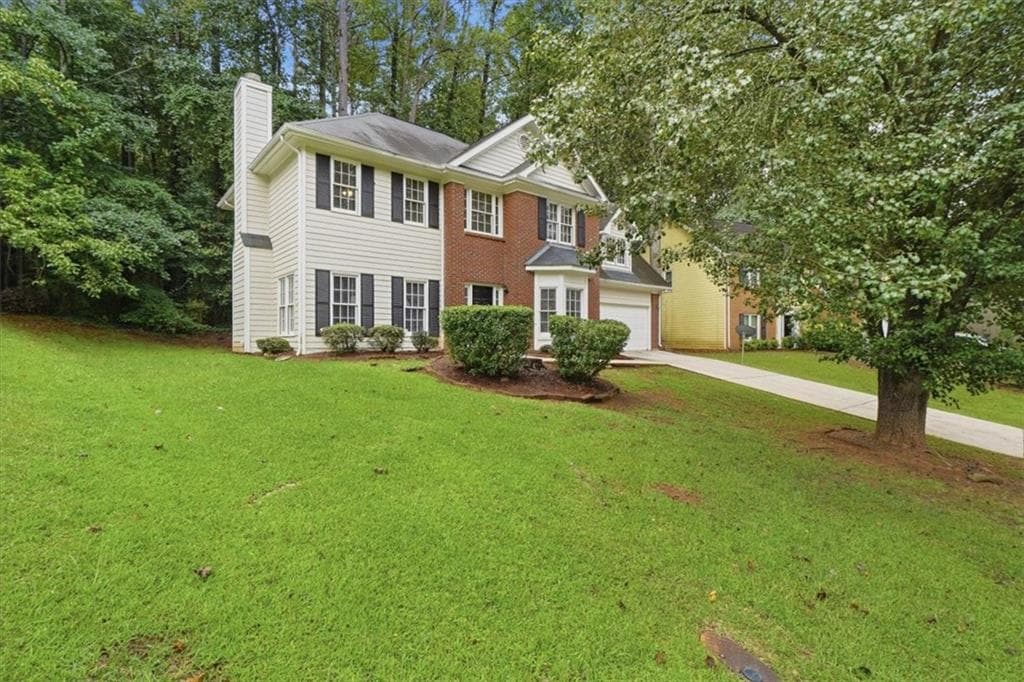 4 bedroom, 3 bathroom, 1,928 sq ft single family residence for sale at 7145 Lone Oak Trace, Lithonia, GA 30058 — photo 3