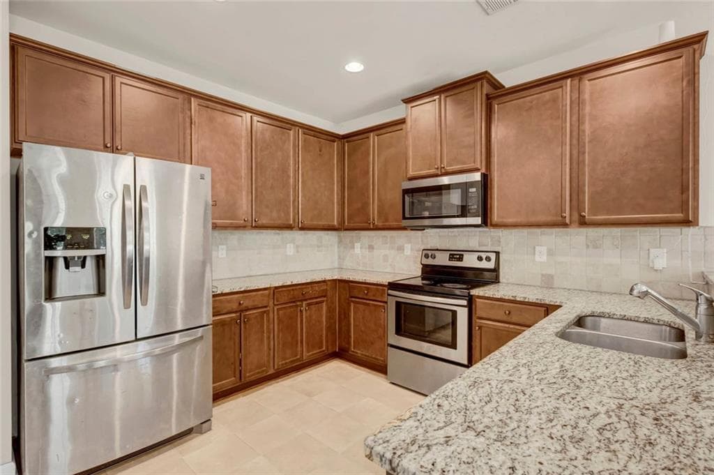 4 bedroom, 3 bathroom, 2,930 sq ft single family residence for sale at 2540 Trelipe Drive, Lawrenceville, GA 30044 — photo 9