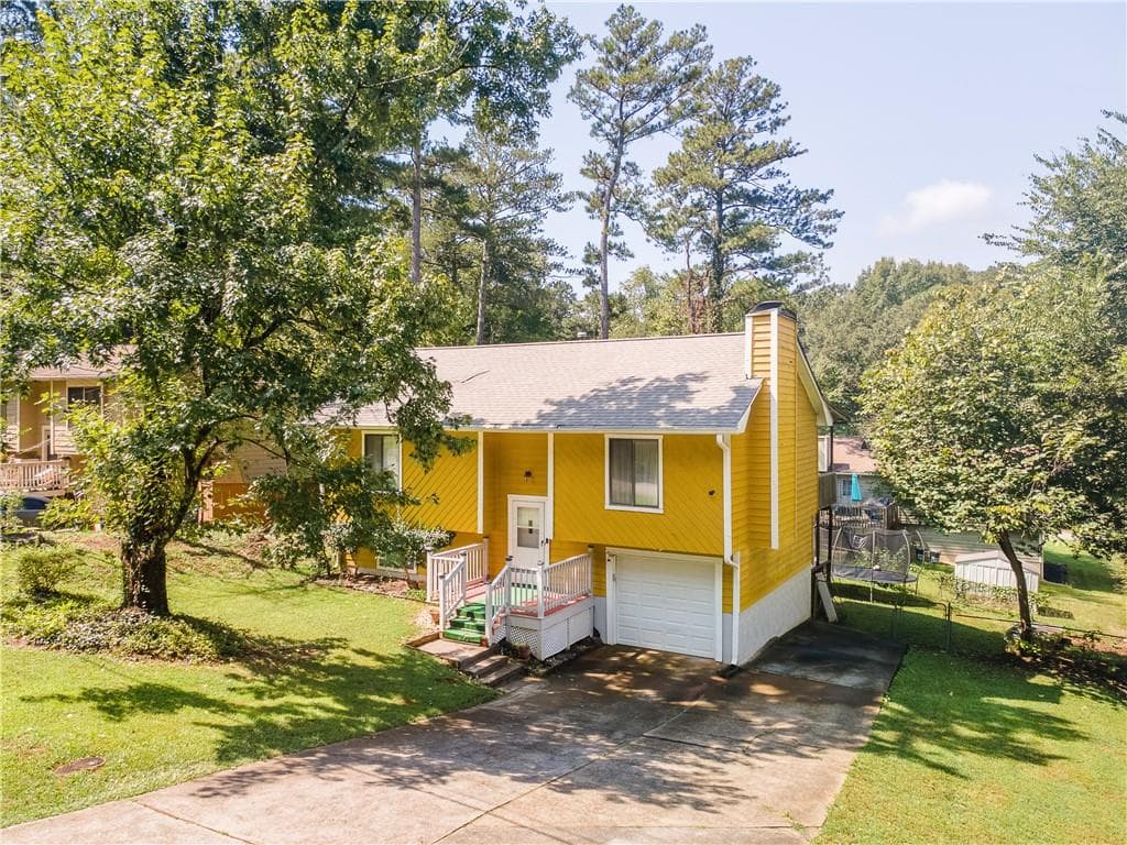 3 bedroom, 2 bathroom, 1,562 sq ft single family residence for sale at 728 Mountain Village Drive, Stone Mountain, GA 30083 — photo 2