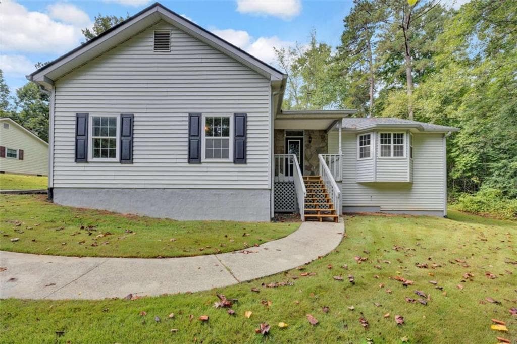 3 bedroom, 2 bathroom, 1,476 sq ft single family residence for sale at 2067 Brandy Woods Drive, Conyers, GA 30013 — photo 1 of 34