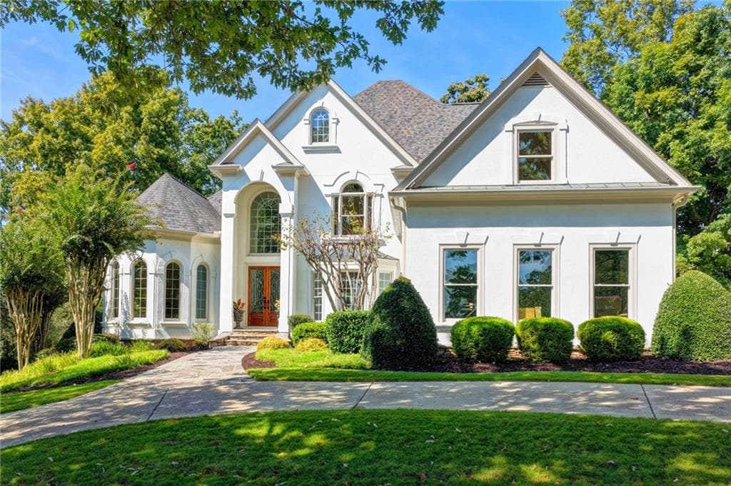 5 bedroom, 6 bathroom, 6,087 sq ft single family residence for sale at 7060 Redcliff Court, Suwanee, GA 30024