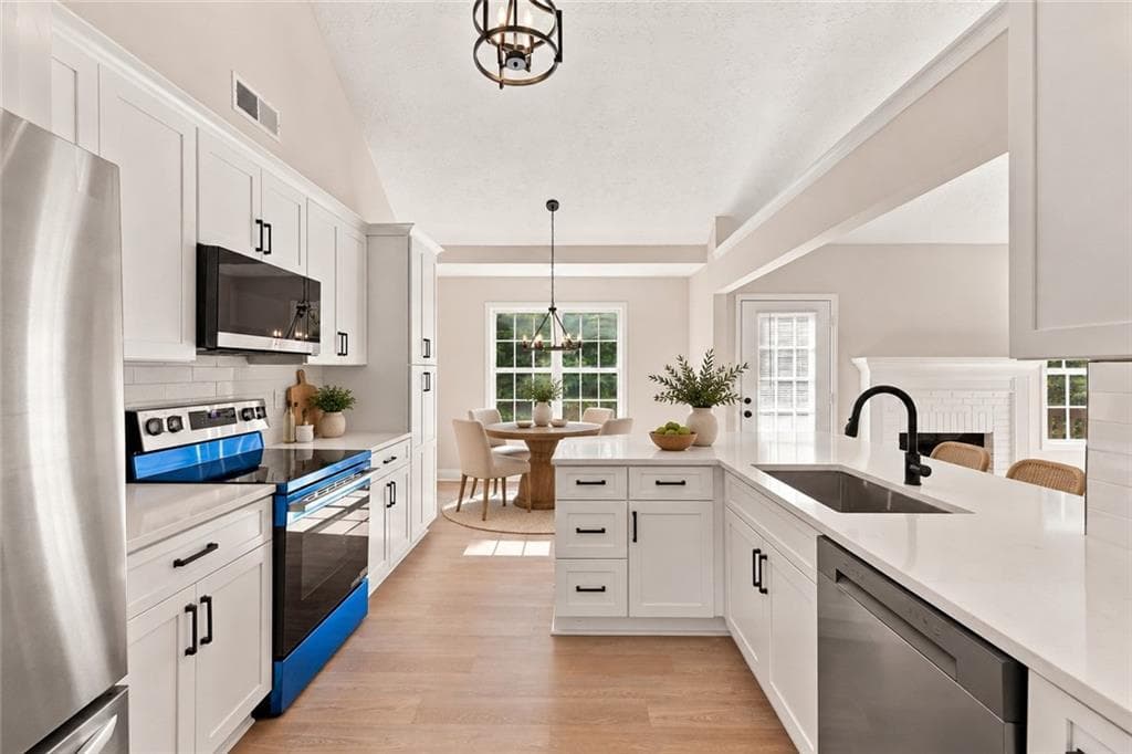 5 bedroom, 3 bathroom, 2,550 sq ft single family residence for sale at 3149 Gem Ives Court, Buford, GA 30519 — photo 3